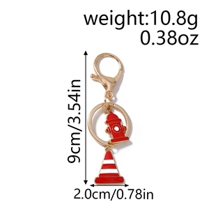 Detailed size view of firefighting keychain with red hydrant and traffic cone pendants
