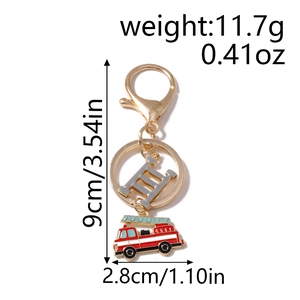Detailed view of firefighting keychain dimensions and weight in red and gold finish