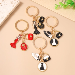 Lot de porte-clés élégants pour femme avec pendentif rose et mini sac en quatre couleurs