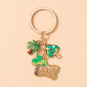 Dettaglio portachiavi da spiaggia con alberi di cocco, fungo e scritta Take Me To The Beach