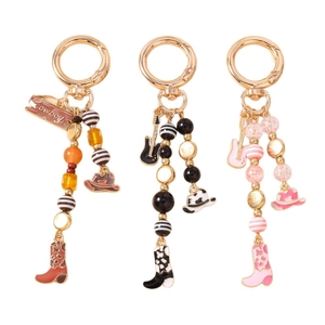 Western cowboy keychains with beads, enamel guitar, hat, and boot charms in three colors