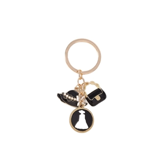 Porte-clés doré élégant avec charms de chapeau en émail noir et mini sac à main chic