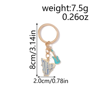 Harp and guitar keychain charms with dimensions and weight measurements on white background