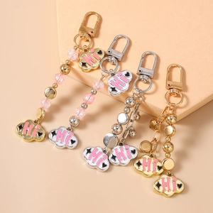 Beaded cloud keychains with Hi lettering charms and colorful decorative star beads