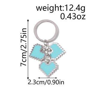 Detail view of blue pixel heart keychain with size and weight measurements included