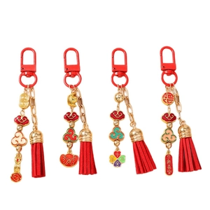 Set of 4 traditional Chinese lucky charms with red tassels and golden auspicious pendants