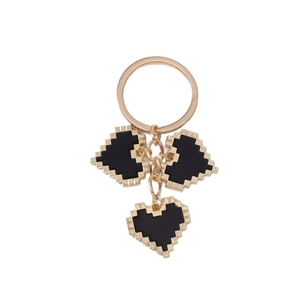Golden keychain with pixel heart pendants in retro game style on white background