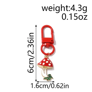 Detailed size specifications of the red mushroom keychain with carabiner dimensions