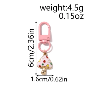 Pink spotted mushroom keychain detail with lobster clasp, size 6cm and weight 4.5g