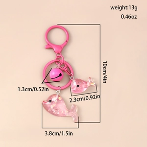 Details zum Delfin Schlüsselanhänger mit Glitzer-Harzfiguren und Abmessungen für Taschen