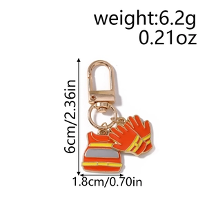 Detail view showing firefighter suit and gloves charms with precise size measurements