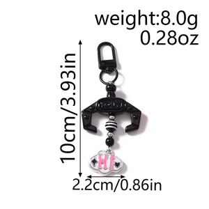 Mechanical claw keychain with striped beads and pink cloud charm showing weight and size