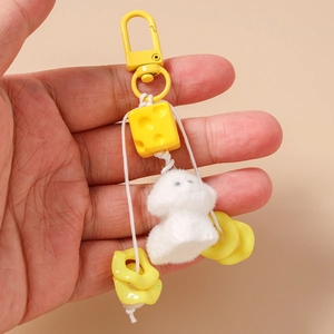 Cute white plush poodle keychain with yellow cheese pendant and vibrant yellow ring buckle