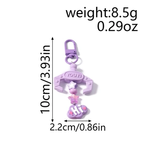 Detail view of purple claw keychain with lavender beads and cloud pendant showing 10cm size