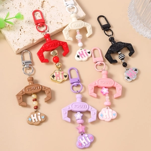 Creative beaded claw machine keychain set with colorful charms and cloud pendants