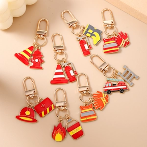 Firefighter enamel keychain set with gold lobster clasp featuring fire truck and hydrant
