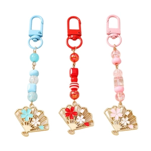 Porte-clés éventail fleurs de cerisier avec perles en bleu, rouge et rose pastel