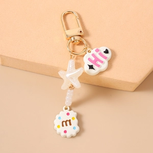 Detail view of starfish keychain with star beads and cute cloud cookie charms
