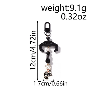 Detailed view of beaded skeleton cat keychain showing 12cm length and 9.1g weight dimensions