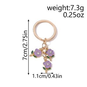 Close-up of purple enamel rose keychain with gold chain and dimensions marked