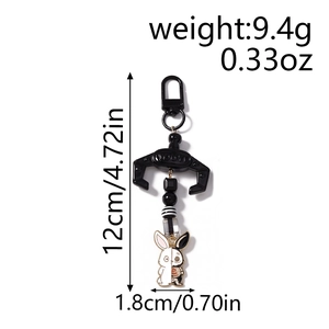Detailed size and weight view of beaded animal keychain with black and white rabbit pendant