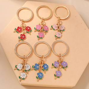 Fashionable rose flower keychains with enamel petals and rhinestones in six vibrant colors