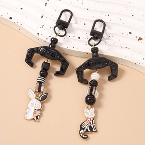 Gothic beaded keychains with skeleton rabbit and cat pendants featuring metal claw hooks