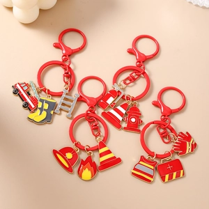 Firefighter keychain set with colorful enamel charms including truck and extinguisher