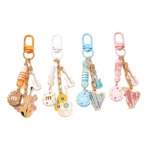 Colorful musical instrument and biscuit keychain set with D-shaped buckles and beads