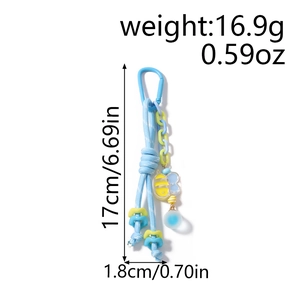 Vue détaillée du porte-clés tressé bleu avec breloque abeille et dimensions du produit