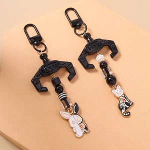 Fashionable beaded animal keychain with skeletal rabbit and moon cat enamel charms