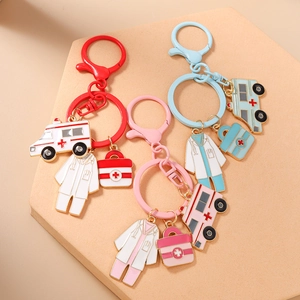 Nurse uniform and ambulance enamel keychain set in red, pink, and blue color variants