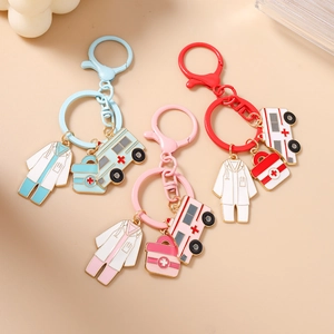 Nurse and medical theme keychain set with ambulance charms in blue, pink and red enamel finish