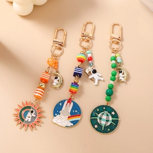 Set de porte-clés astronaute avec perles colorées et breloques de l'espace en métal