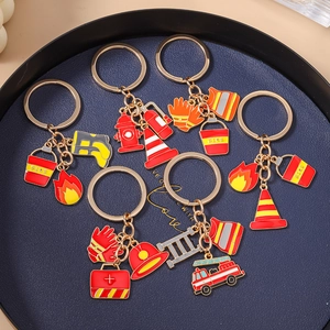 6-piece firefighter theme keychain set with fire truck, extinguisher and helmet charms