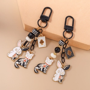 Gothic skull cat and rabbit keychain with poker card charms and black beads