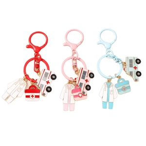 Medical themed keychain set featuring nurse scrubs, ambulance and kit bag charms