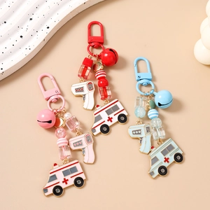 Healthcare themed keychains with bell, beads, thermometer and ambulance charms in 3 colors