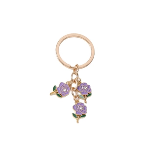 Elegant gold metal keychain featuring three purple enamel roses with white rhinestones