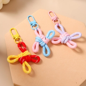 Handmade woven knot keychain set with metal clasps in assorted pastel colors