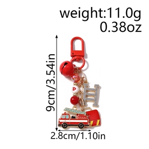 Macro shot showing firefighter keychain details with red ladder and fire truck charms