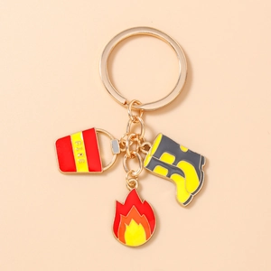 Detail of firefighter keychain featuring red fire bucket, flame and boot alloy pendants