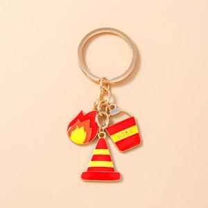 Detail of firefighter keychain with red fire cone and enamel flame charm pendants