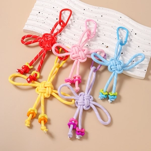 Handmade Chinese knot style woven keychains in five vibrant colors with snap hooks