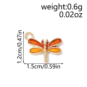 Pendentif libellule en alliage avec émail dégradé orange et finition en métal doré