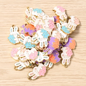 Close-up of colorful enamel rabbit charms for DIY jewelry making accessories