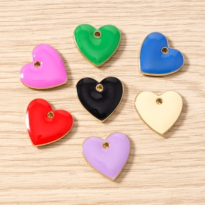Set of colorful enamel heart pendants in seven colors for DIY jewelry making