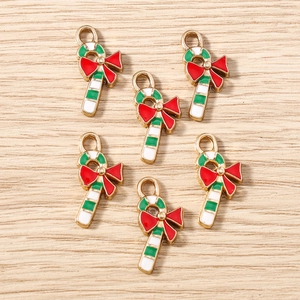 Christmas candy cane pendants with red bow for DIY jewelry making in festive colors