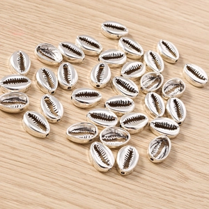 Macro di ciondoli a conchiglia in lega d'argento per creazione di gioielli fai-da-te