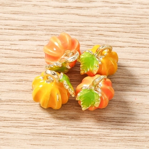 Set of 4 realistic orange pumpkin charms with green leaves for DIY jewelry making